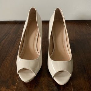 White open-toes pumps